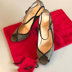 Patent black and gold keyhole stilettos